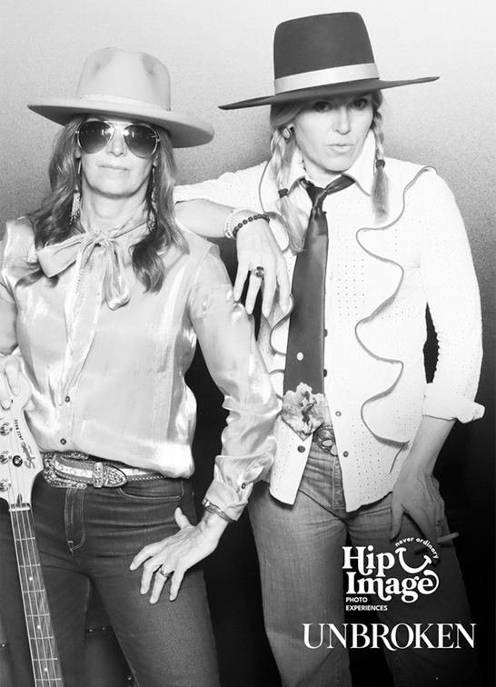 Hip Image Creative Director posing guests at a corporate Glam Photo Booth